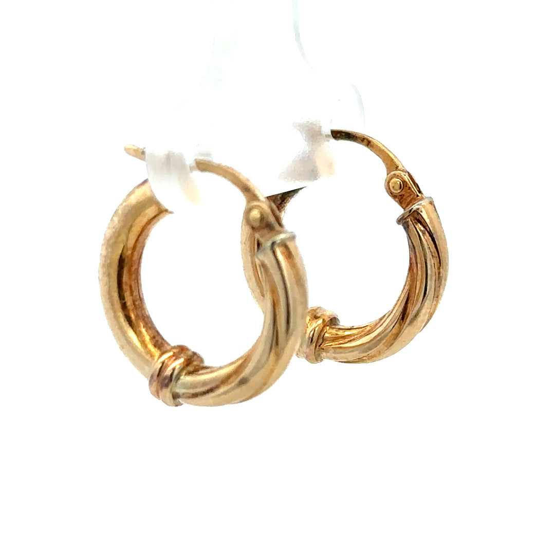 9ct yellow gold hoop earrings with a 1.5g weight, featuring a classic round design and a secure clasp.