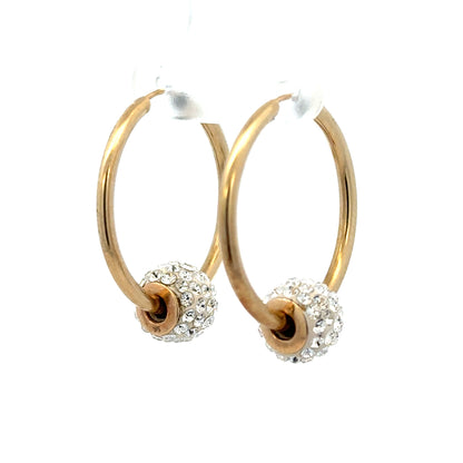 Smaller 9ct yellow gold hoop earrings weighing 2.2g, with a classic round design and polished finish.
