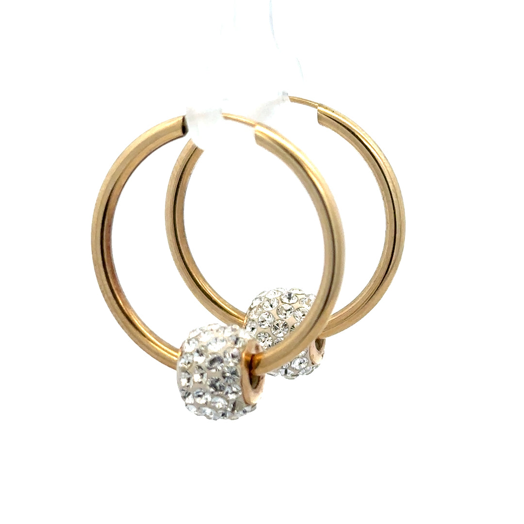 9ct yellow gold hoop earrings, lightweight and classic jewelry, shown in a close-up image highlighting their circular shape and polished finish.