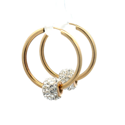 9ct yellow gold hoop earrings, lightweight and classic jewelry, shown in a close-up image highlighting their circular shape and polished finish.