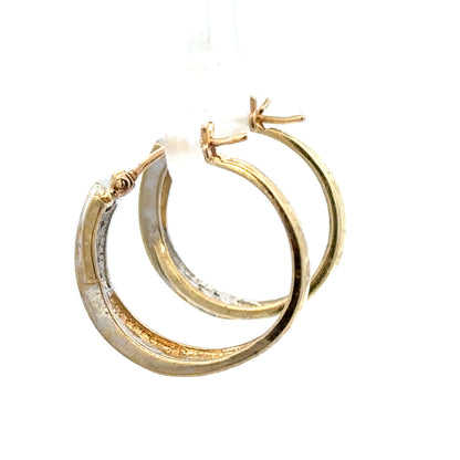 9ct yellow gold hoop earrings weighing 3.5g, unbranded, with a classic circular design and polished finish.