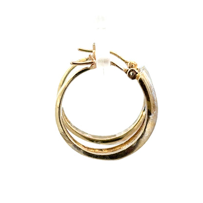 9ct yellow gold hoop earrings, unbranded, 3.5g, classic round design, shiny finish, photographed on a plain background.