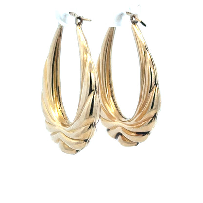 9ct yellow gold hoop earrings weighing 3.8g, featuring a classic round design and secure clasp, unbranded jewelry accessory.