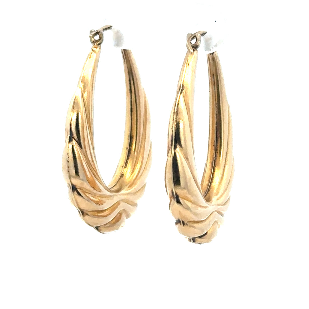 9ct yellow gold hoop earrings weighing 3.8g, featuring classic circular design and secure clasp closure.