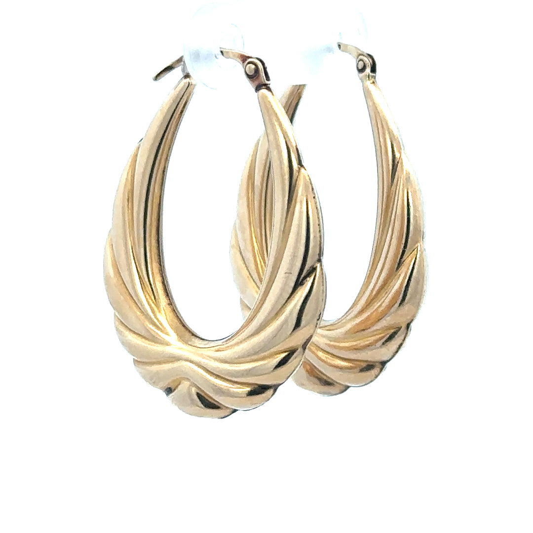 9ct yellow gold hoop earrings weighing 3.8g with a classic design, suitable for everyday wear and stylish accessories.