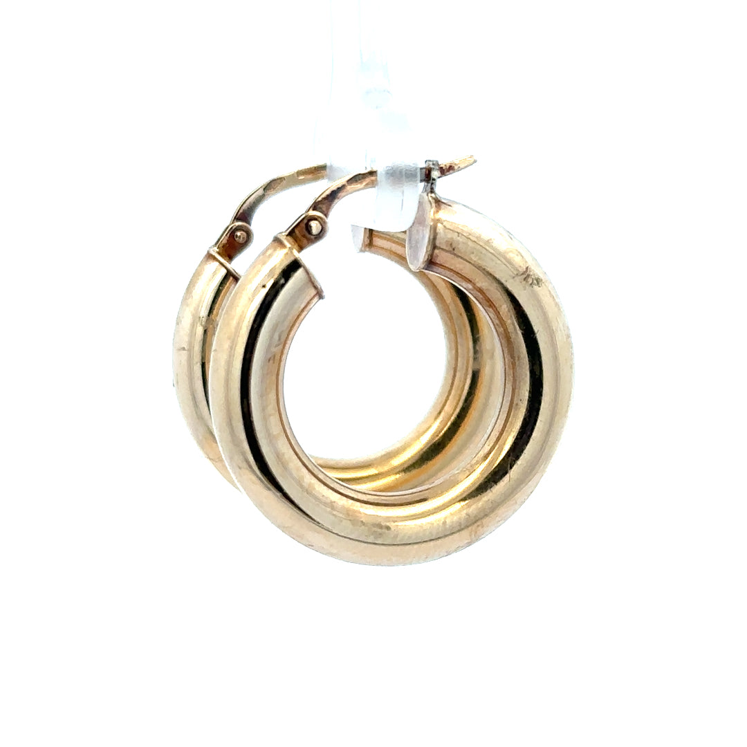 9ct yellow gold hoop earrings with a classic round design, weighing 3.9g, shown on a plain background.