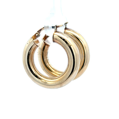 9ct yellow gold hoop earrings, unbranded, weighing 3.9g, with a classic circular design and polished finish.