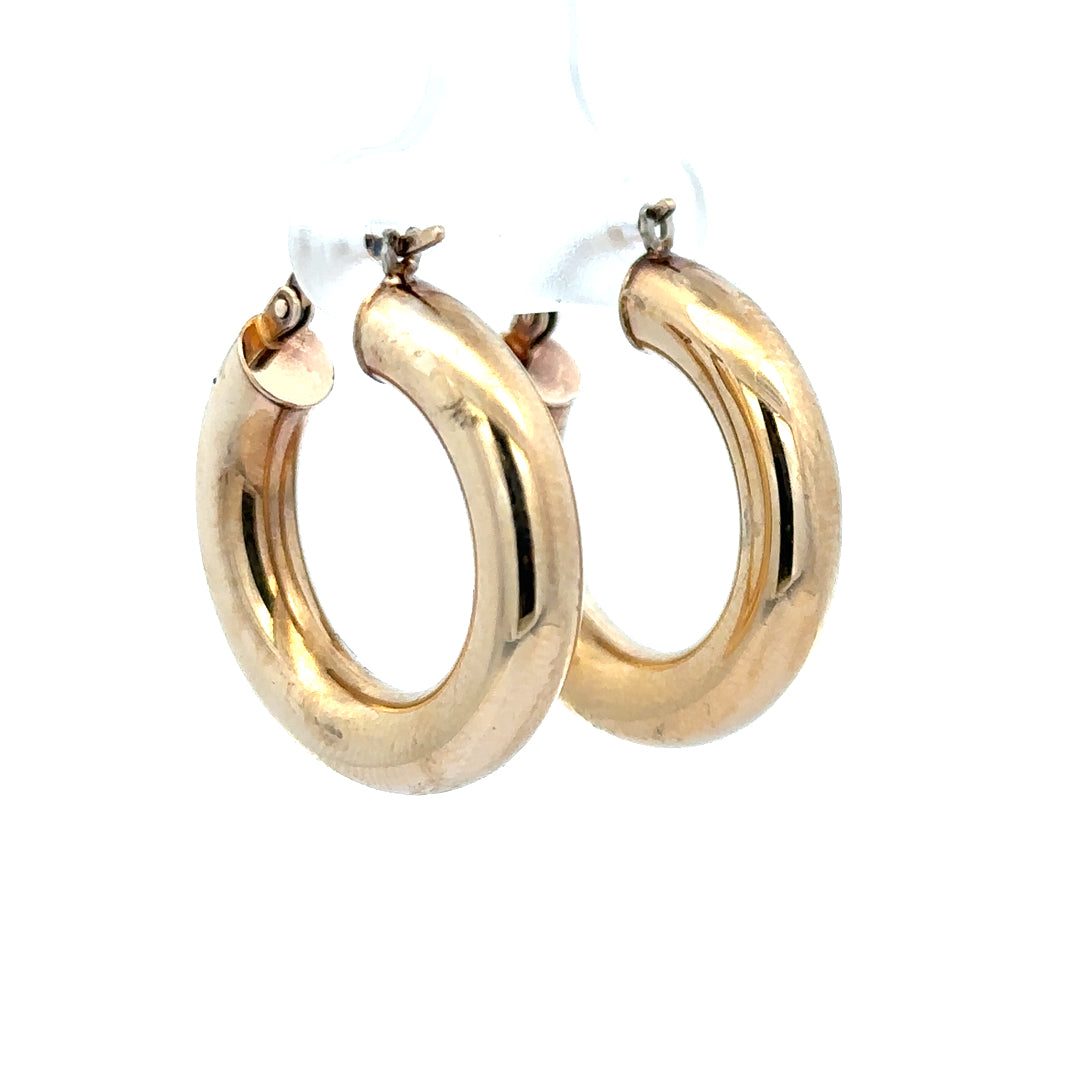 9ct yellow gold hoop earrings weighing 3.9g, featuring a classic round design, unbranded jewelry for everyday wear.