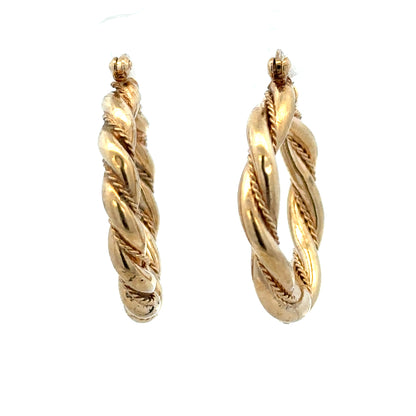 9ct yellow gold hoop earrings weighing 4.9g, featuring a classic round design with a secure clasp.