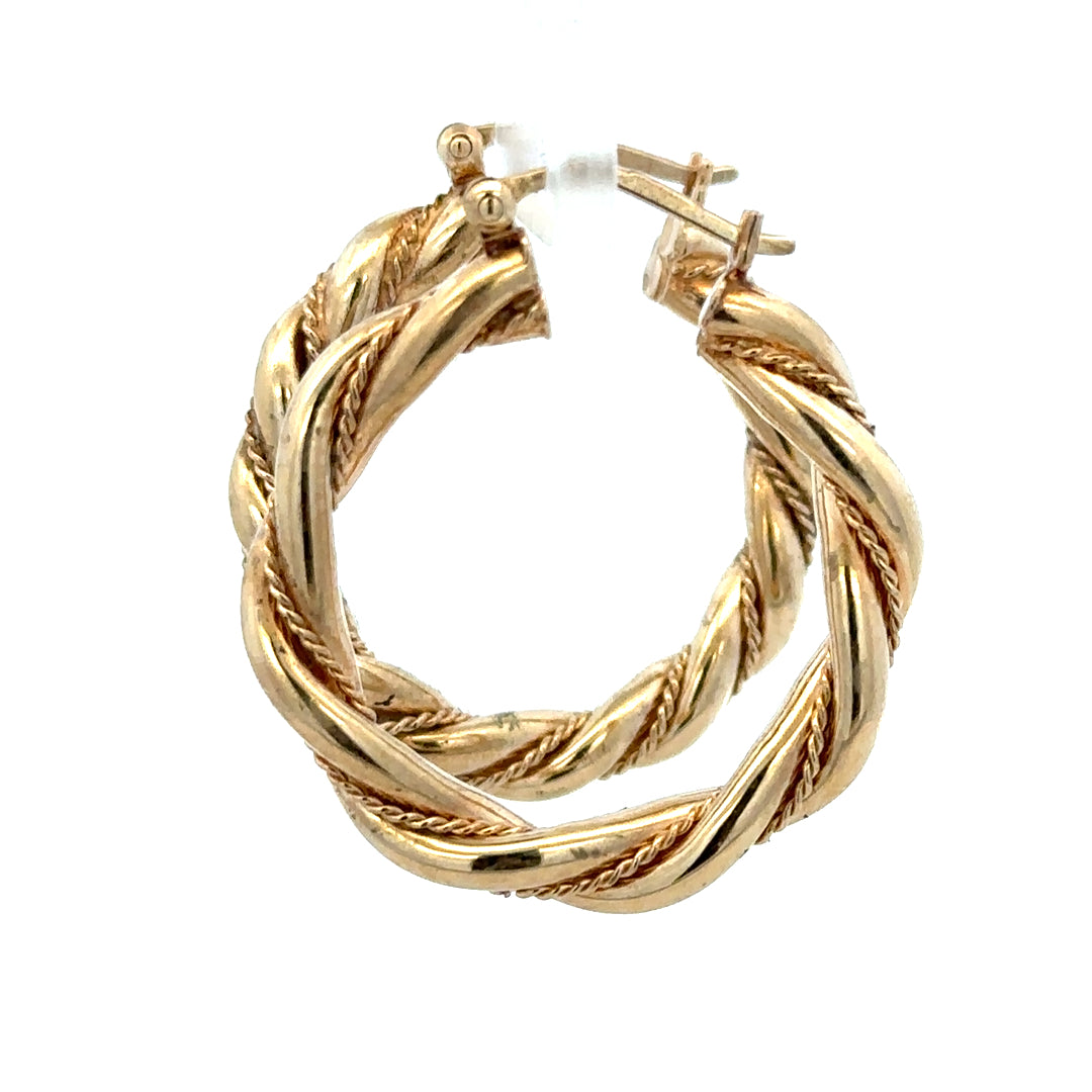 9ct yellow gold hoop earrings weighing 4.9g, featuring a classic round design and polished finish.