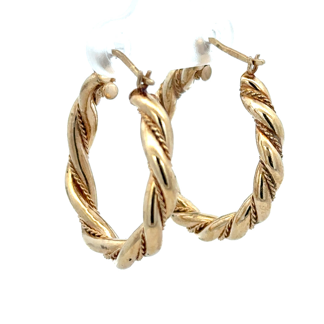 9ct yellow gold hoop earrings weighing 4.9g, showcasing classic round design with a polished finish.