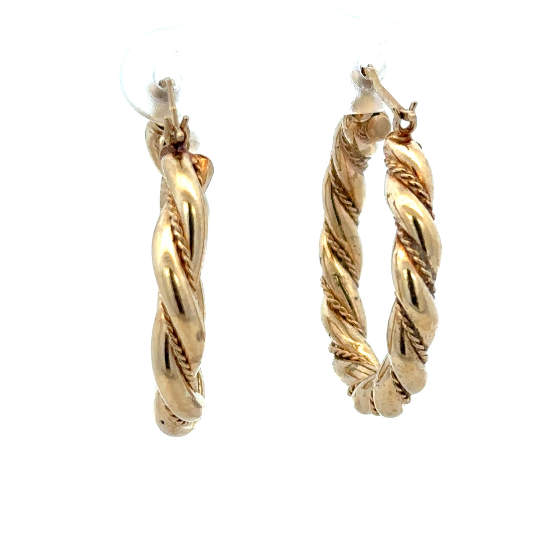 9ct yellow gold hoop earrings weighing 4.9g, classic round design, unbranded jewelry with a polished finish
