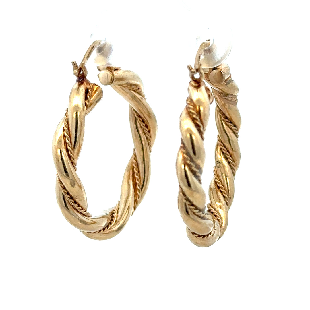 9ct yellow gold hoop earrings weighing 4.9g, unbranded, featuring smooth polished finish and classic circular design.