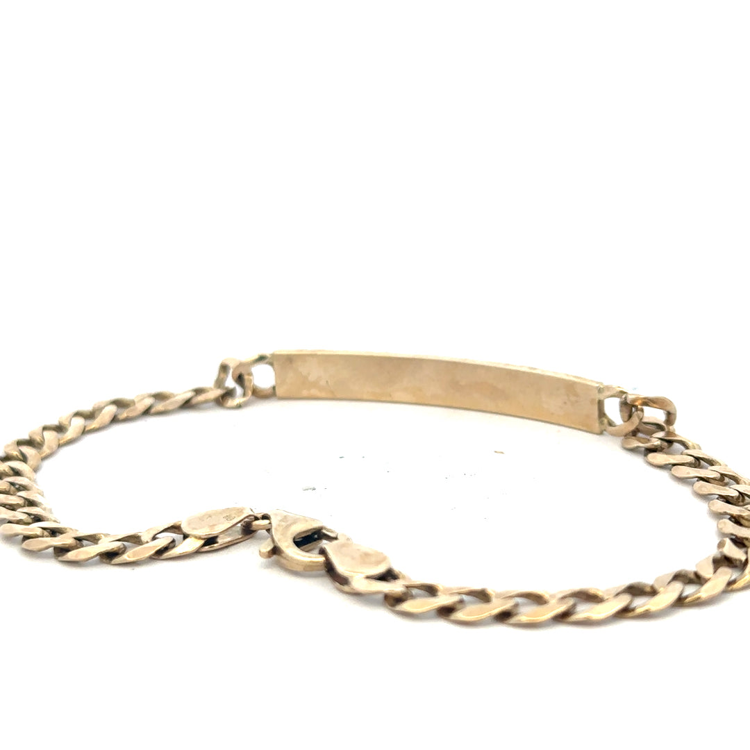 9ct yellow gold ID bracelet weighing 11.6g, unbranded, with a sleek design and polished finish.