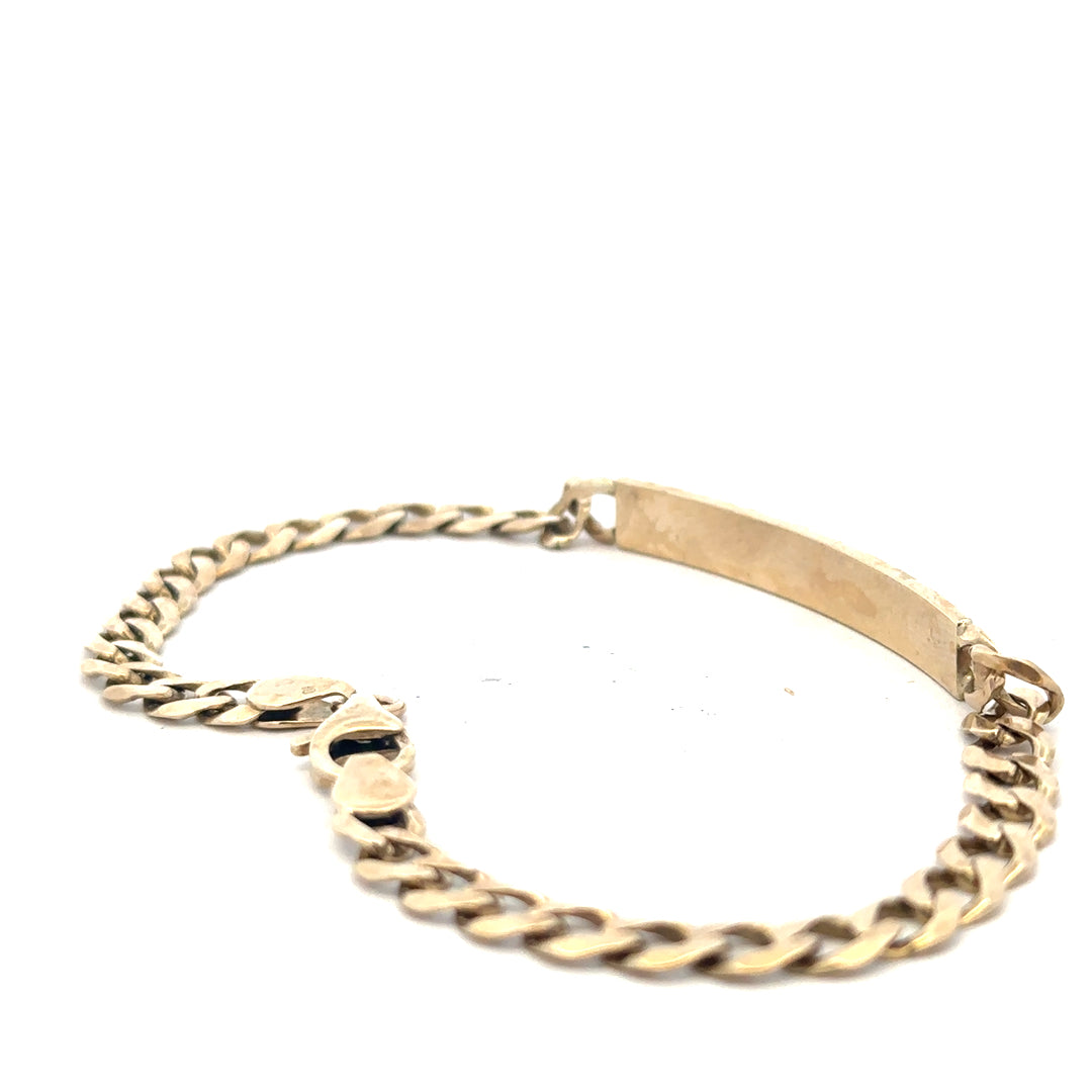 9ct yellow gold ID bracelet weighing 11.6g with a sleek design, featuring a polished gold finish and an adjustable clasp.