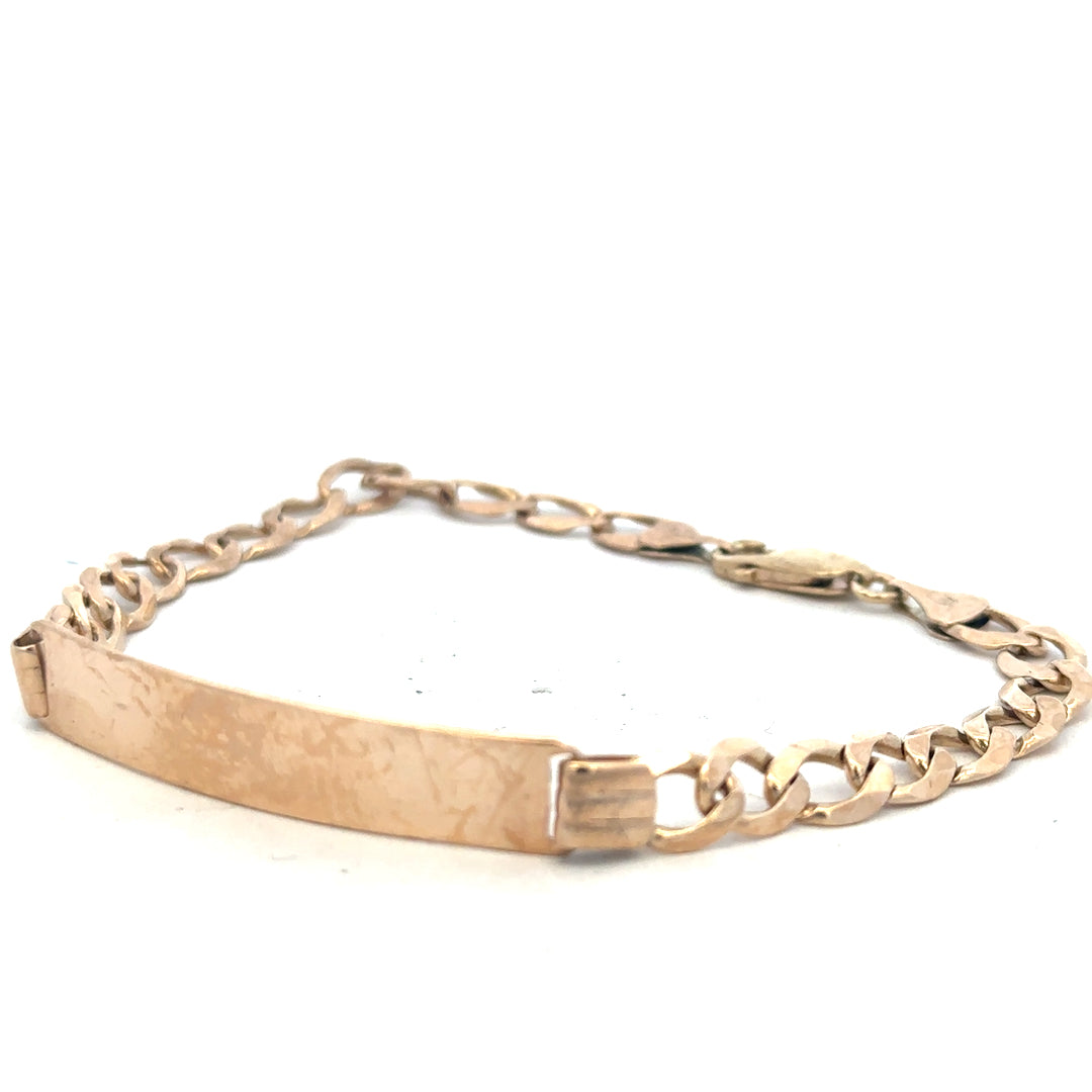 9ct yellow gold ID bracelet weighing 9.7g, unbranded, with a sleek, polished design shown in the image.