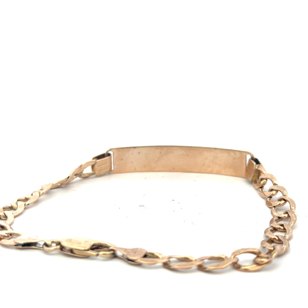 9ct yellow gold ID bracelet weighing 9.7g, unbranded, with a sleek, polished finish, displayed on a neutral background.