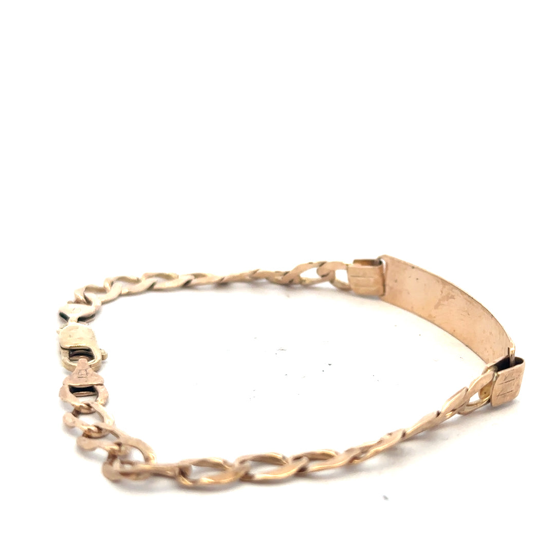 9ct yellow gold ID bracelet weighing 9.7g with a sleek, polished design and secure clasp.