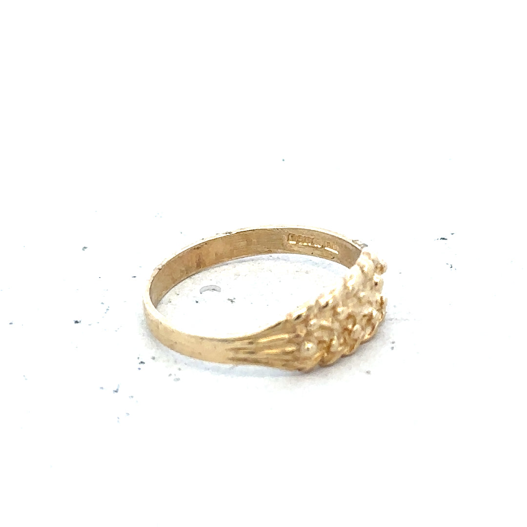 9ct yellow gold keeper ring in size H with a smooth band and secure clasp, showcasing a classic jewelry design.