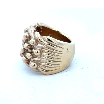 9ct yellow gold keeper ring in size W, unbranded, featuring a smooth band and secure clasp for daily wear.