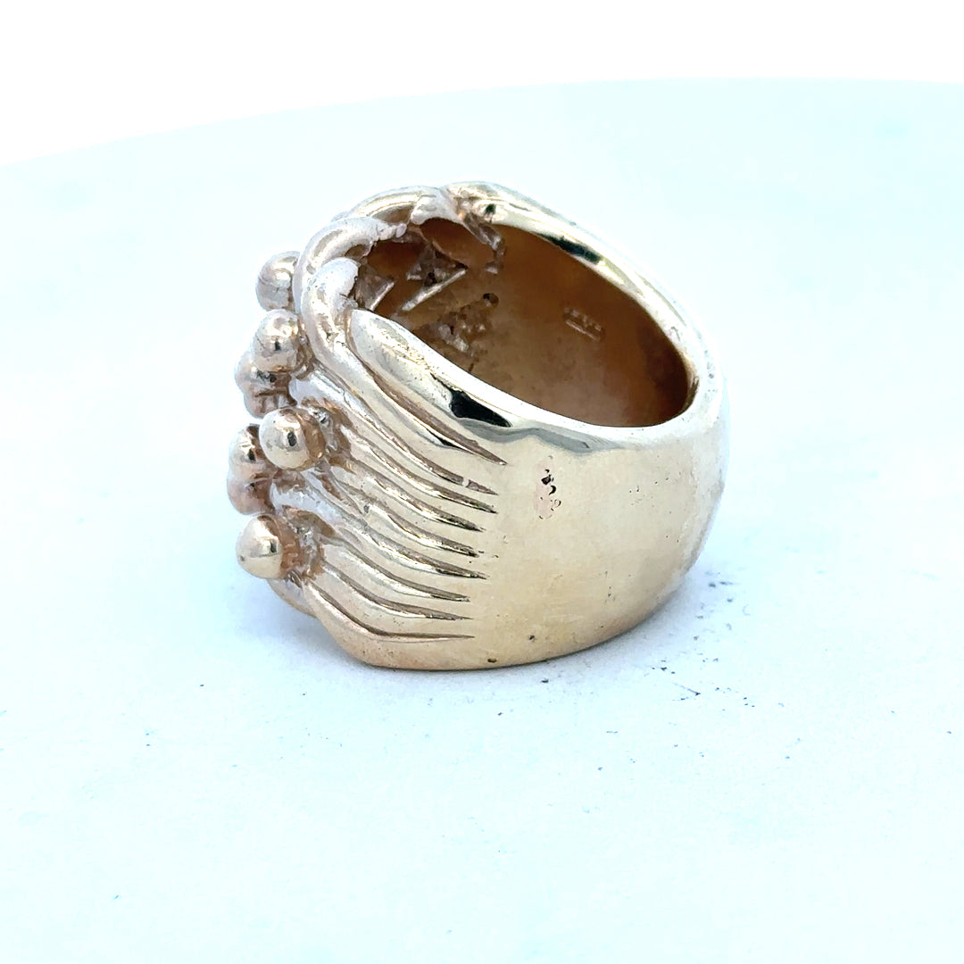 9ct yellow gold keeper ring in size W with a classic design, featuring a smooth band and secure fitting.