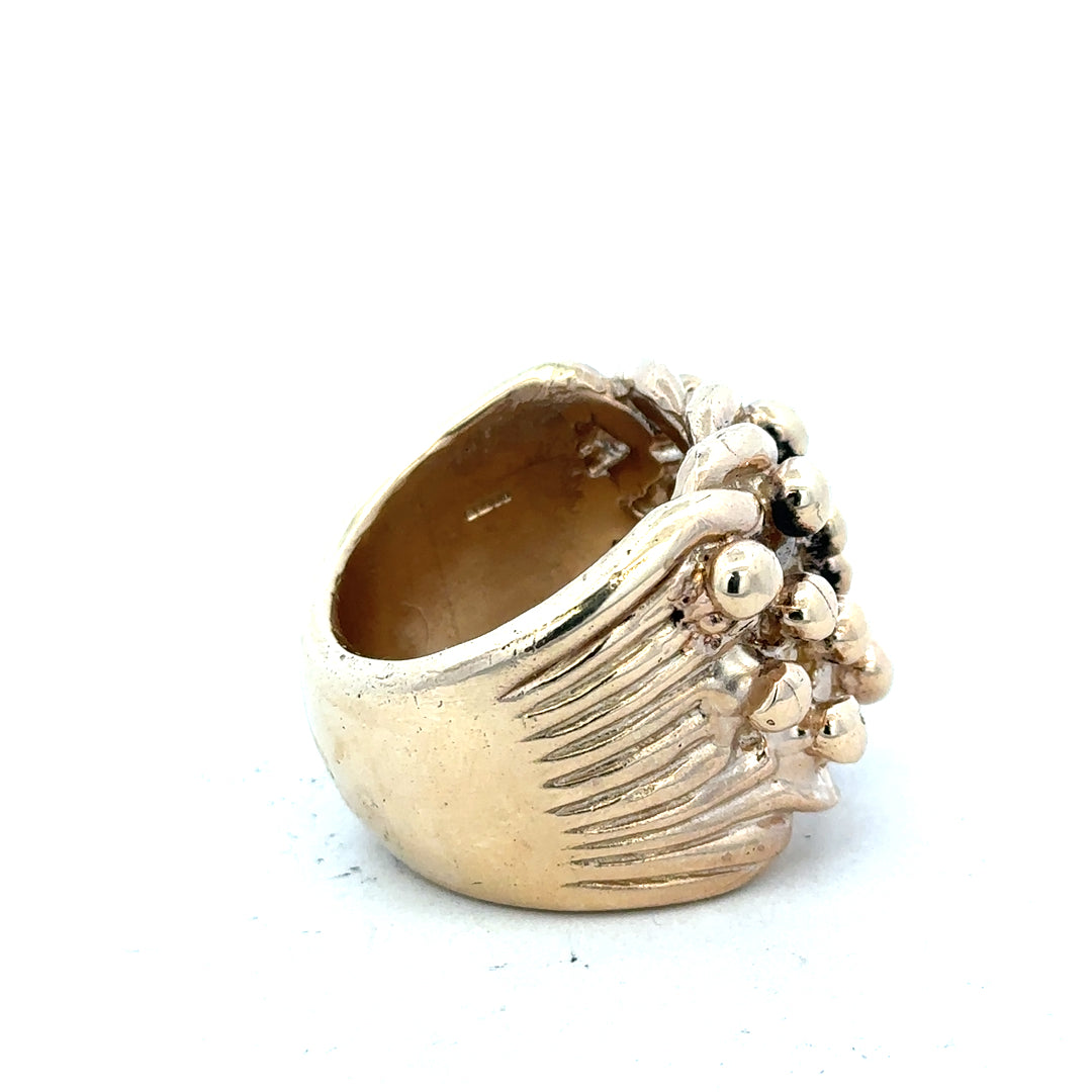 9ct yellow gold keeper ring in size W with a simple band design, unbranded, shown on a white background.