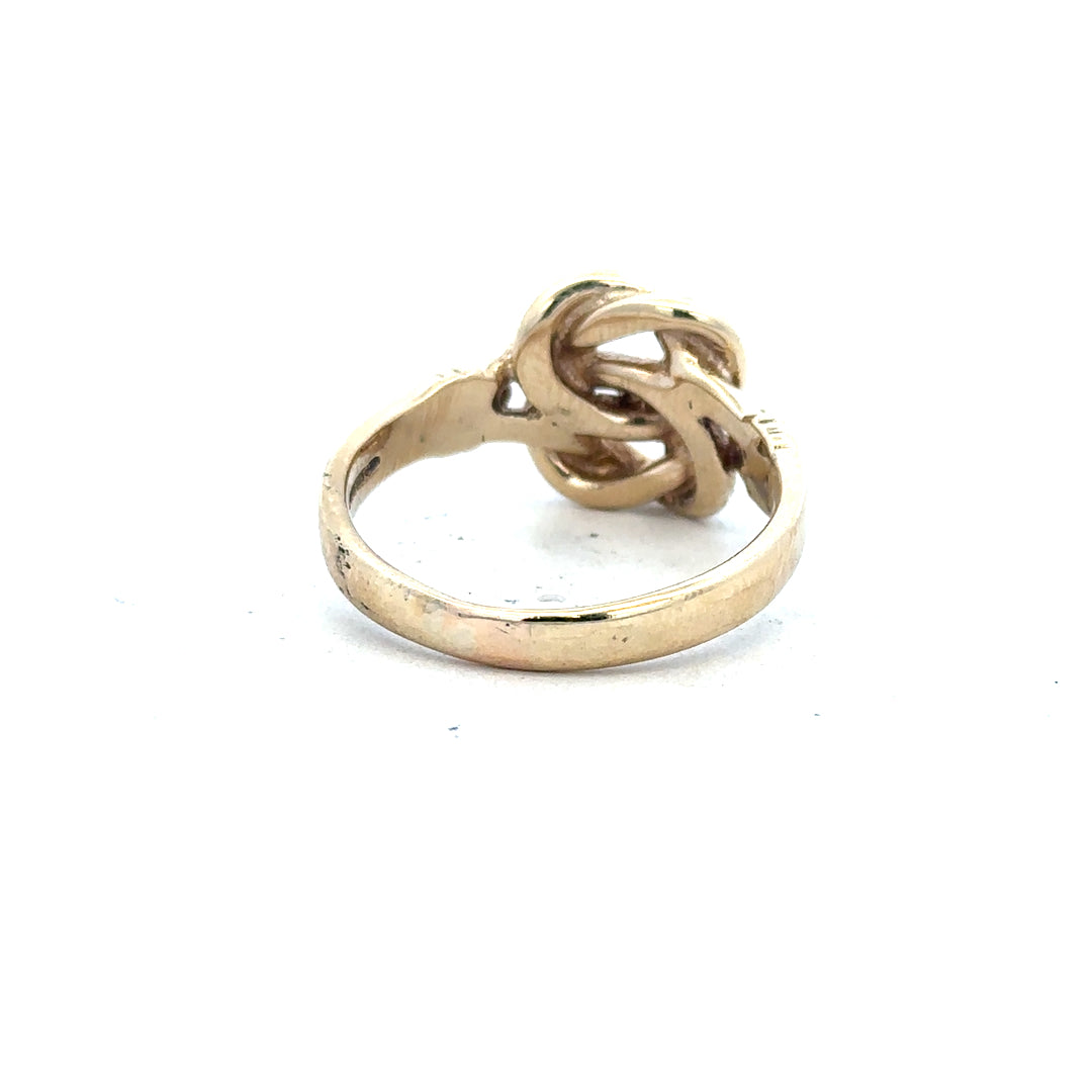 9ct yellow gold knot ring in size Z1, featuring a polished design and smooth band, unbranded for elegant jewelry styling