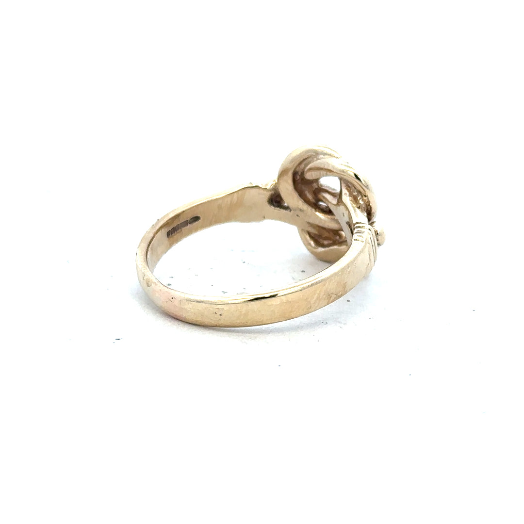 9ct yellow gold knot ring in size Z1, featuring a simple, elegant design with a polished finish.