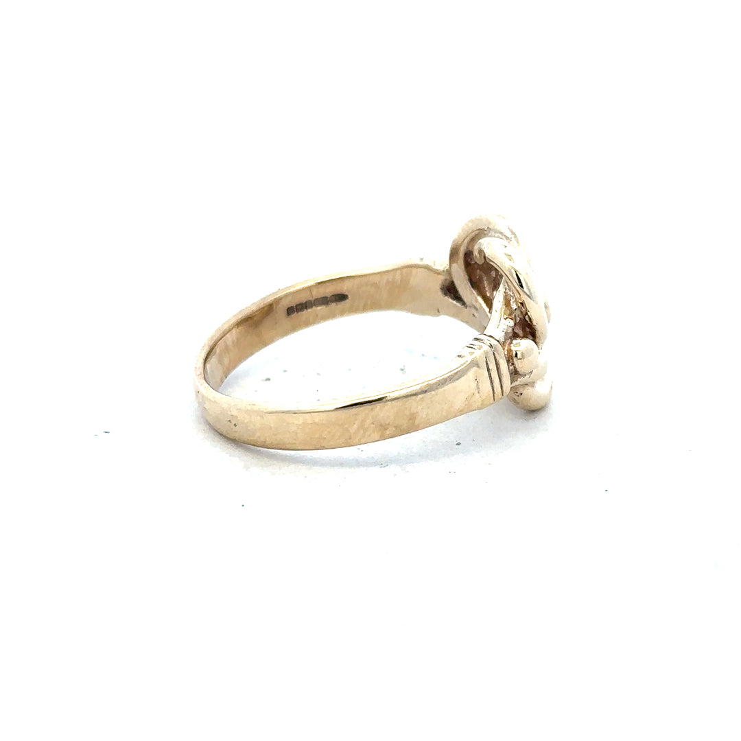 9ct yellow gold knot ring in size Z1, showcasing a sleek, polished design with a knot detail, unbranded jewelry.