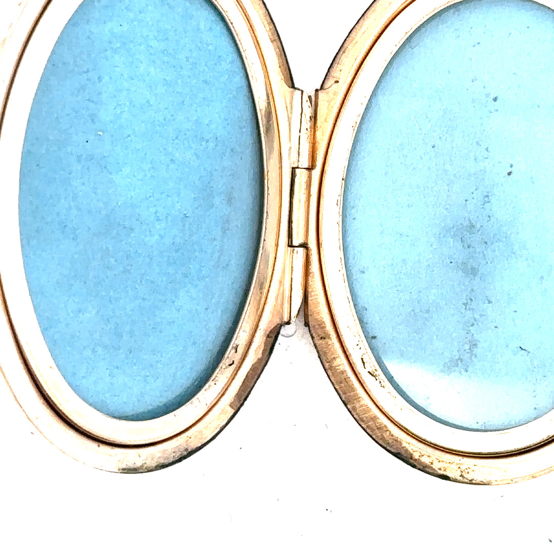 9ct yellow gold locket pendant with intricate design, weighs 13.8g, showcasing a classic jewelry piece.