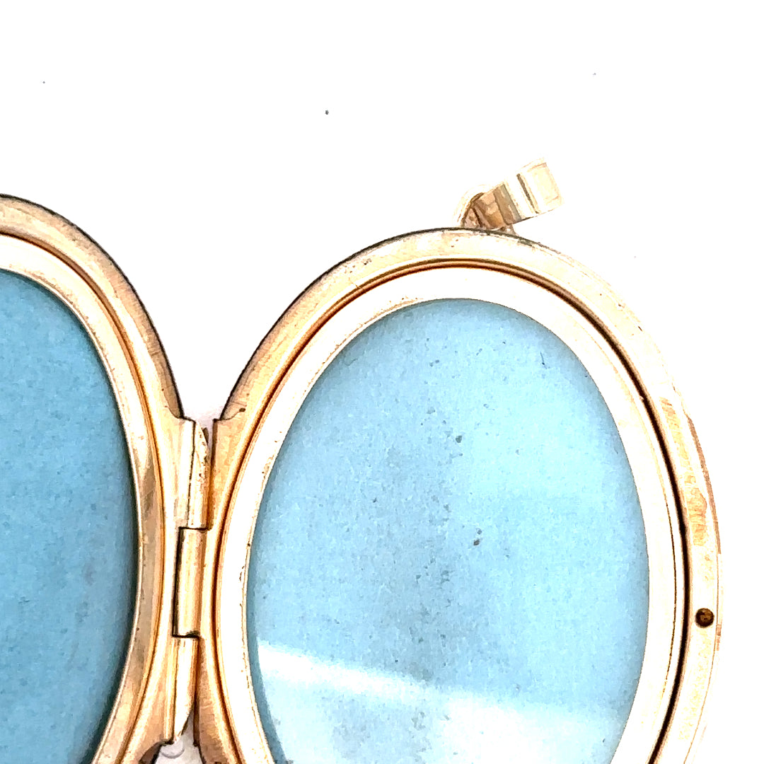 9ct yellow gold locket pendant with intricate design, weighing 13.8g, featuring a classic and elegant style.