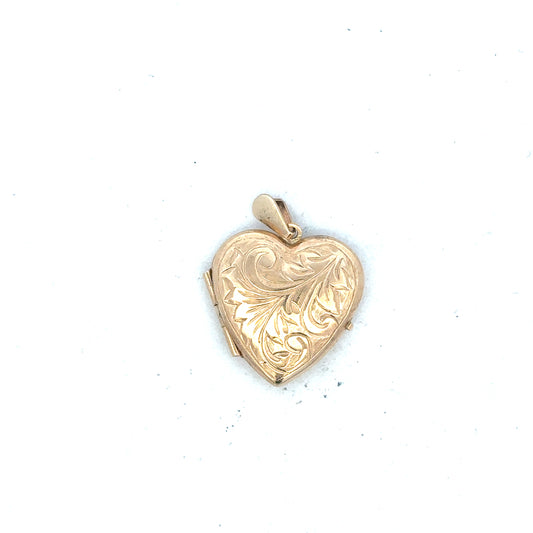 9ct yellow gold locket pendant weighing 2.5g, elegant jewelry piece with detailed design, unbranded, suitable for necklaces.