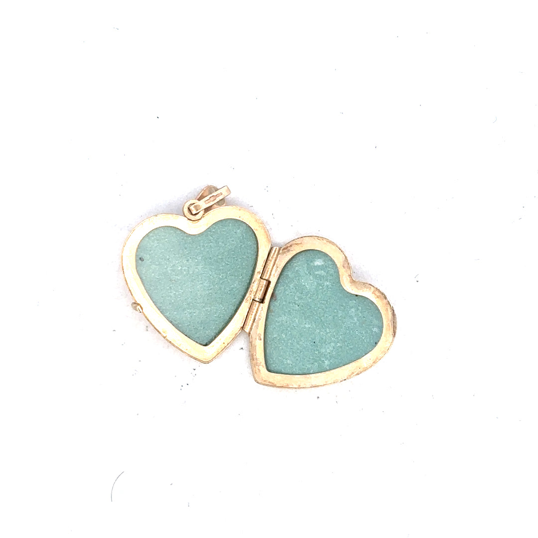 9ct yellow gold locket pendant, unbranded, 2.5g, showcasing a classic round design with intricate engraved details.