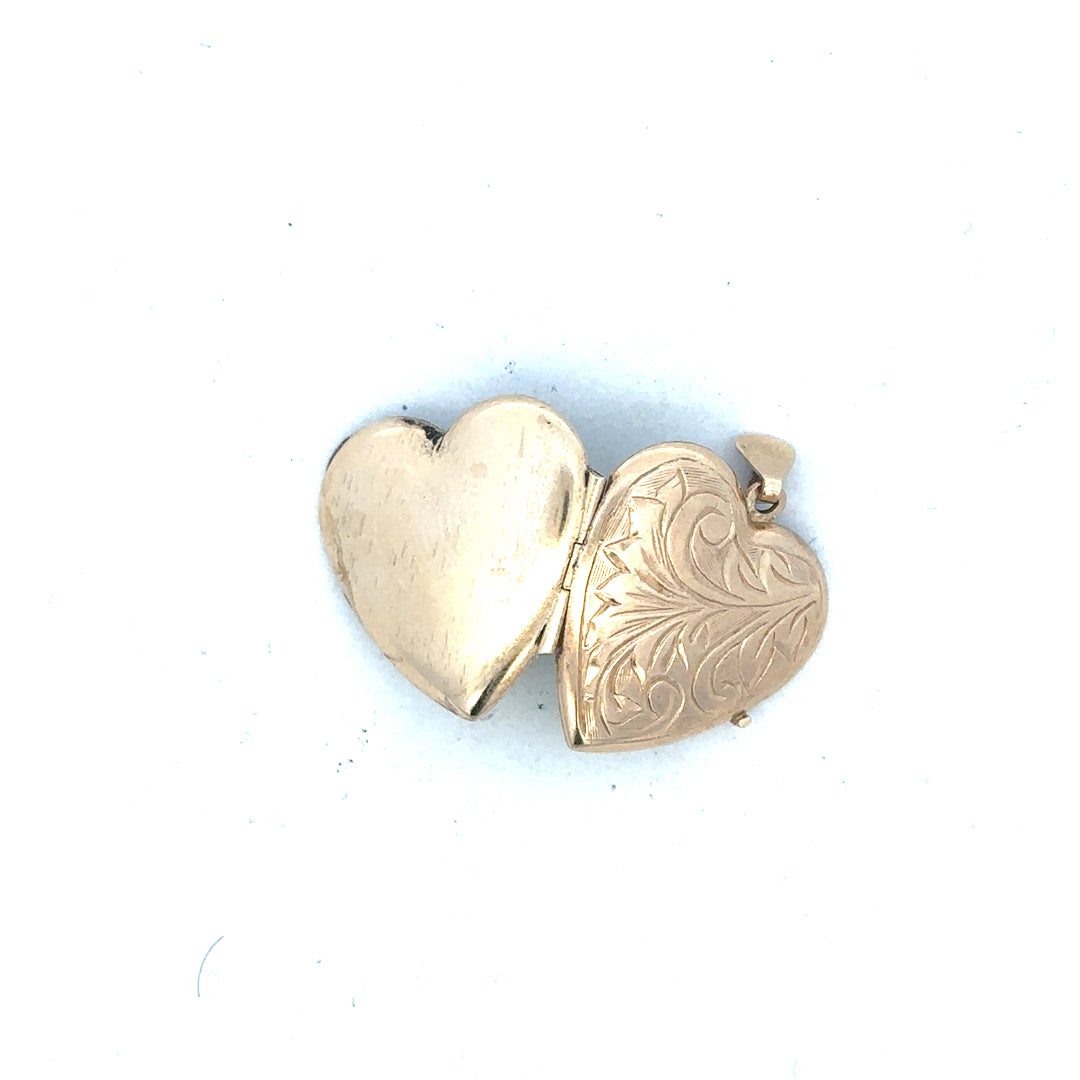 9ct yellow gold locket pendant weighing 2.5g with intricate design, unbranded jewelry, classic keepsake accessory.