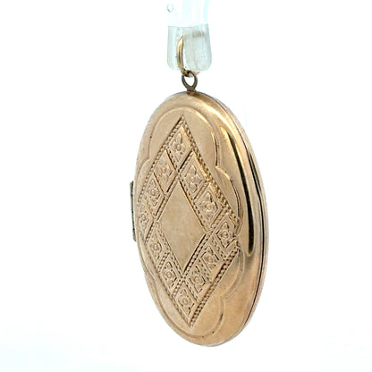 9ct yellow gold locket pendant with intricate design, weighing 5.8g, featuring a classic style and a polished finish.