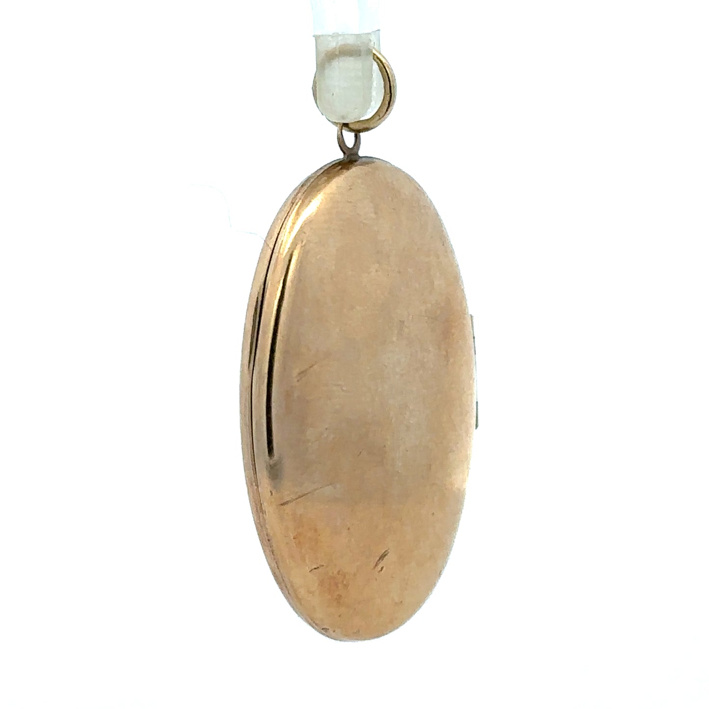 9ct yellow gold locket pendant weighing 5.8g, unbranded, featuring a classic design with a polished finish.
