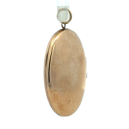 9ct yellow gold locket pendant weighing 5.8g, unbranded, featuring a classic design with a polished finish.
