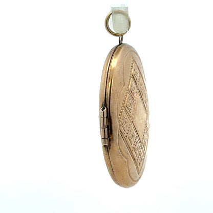 9ct yellow gold locket pendant, 5.8g, unbranded, featuring a classic design with a polished finish and secure clasp.
