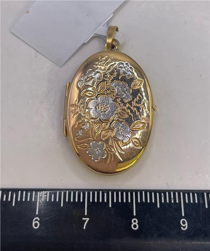 9ct yellow gold locket, unbranded, with a smooth rounded design, displayed against a neutral background.