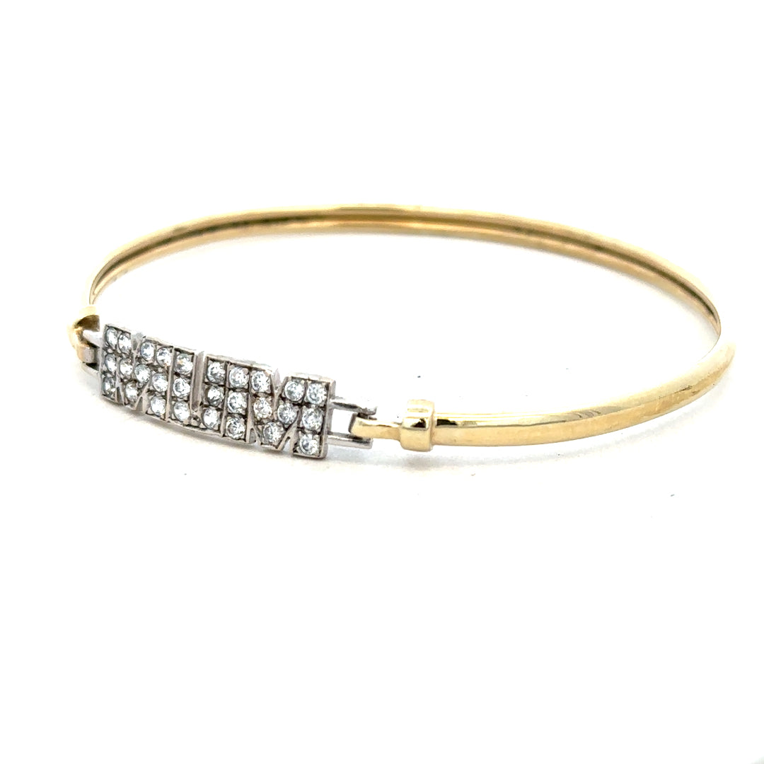 9ct yellow gold Mum bangle with 5.3g weight, featuring a sleek unbranded design and smooth finish.