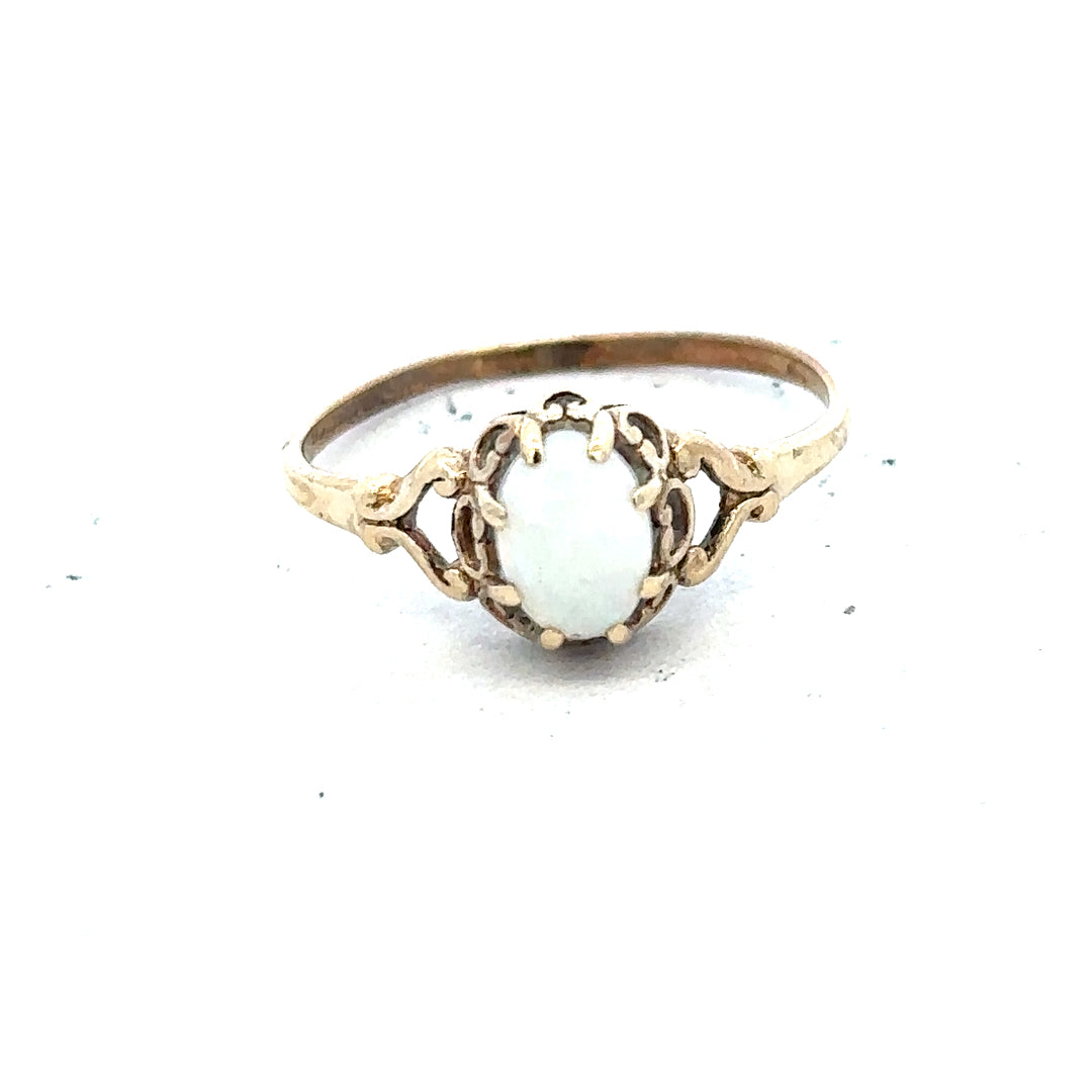 9ct yellow gold opal ring in size P with a vibrant, polished opal gemstone, featuring a sleek gold band.