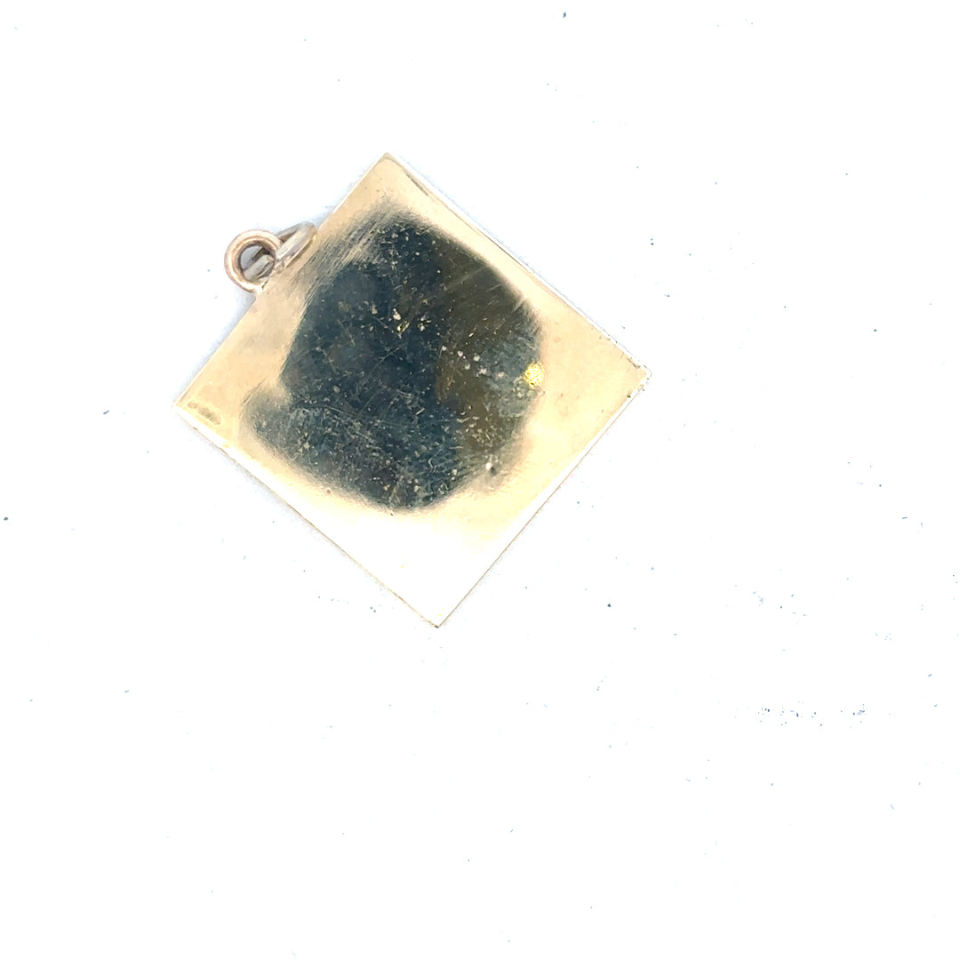 9ct yellow gold pendant weighing 9.6g, unbranded, featuring a detailed design, displayed against a neutral background.