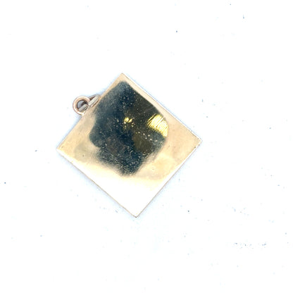 9ct yellow gold pendant weighing 9.6g, featuring a simple elegant design, unbranded jewelry for women or men.