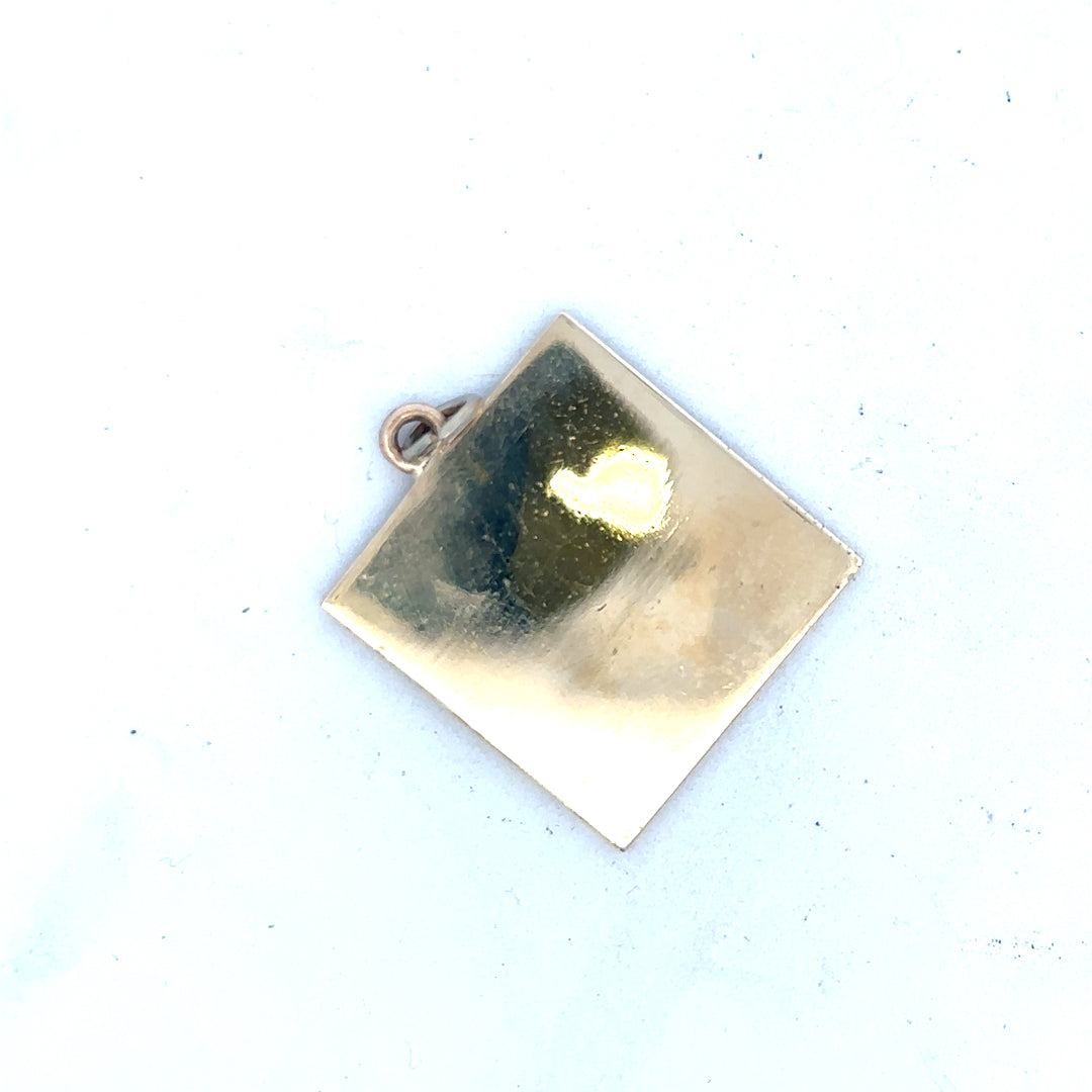9ct yellow gold pendant weighing 9.6g, featuring a classic design, displayed against a neutral background.