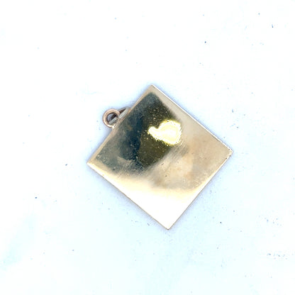 9ct yellow gold pendant weighing 9.6g, featuring a classic design, displayed against a neutral background.