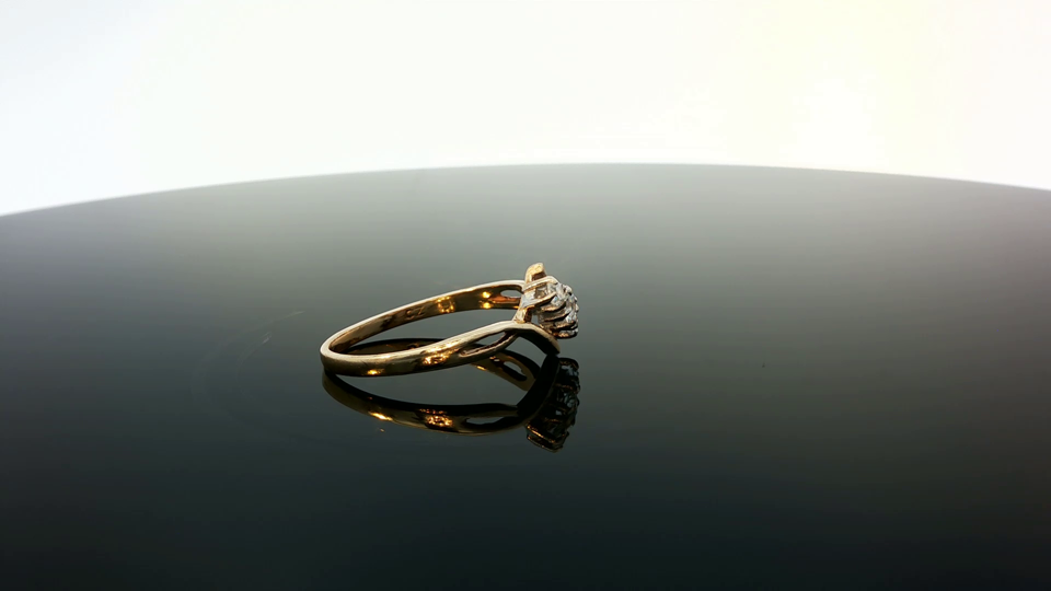 9ct yellow gold ring with a smooth polished band, simple and elegant unbranded jewelry piece.