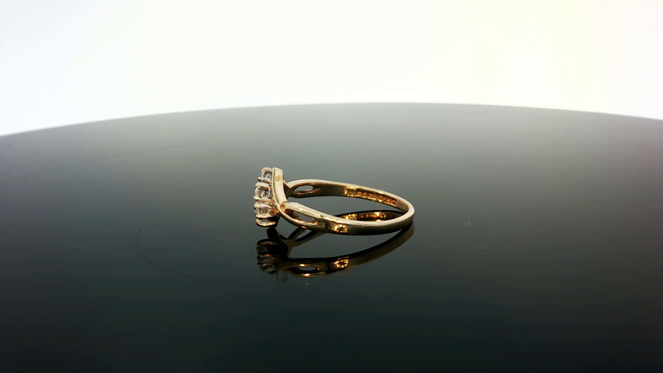 9ct yellow gold ring with a smooth polished finish, showcasing a classic and elegant design.