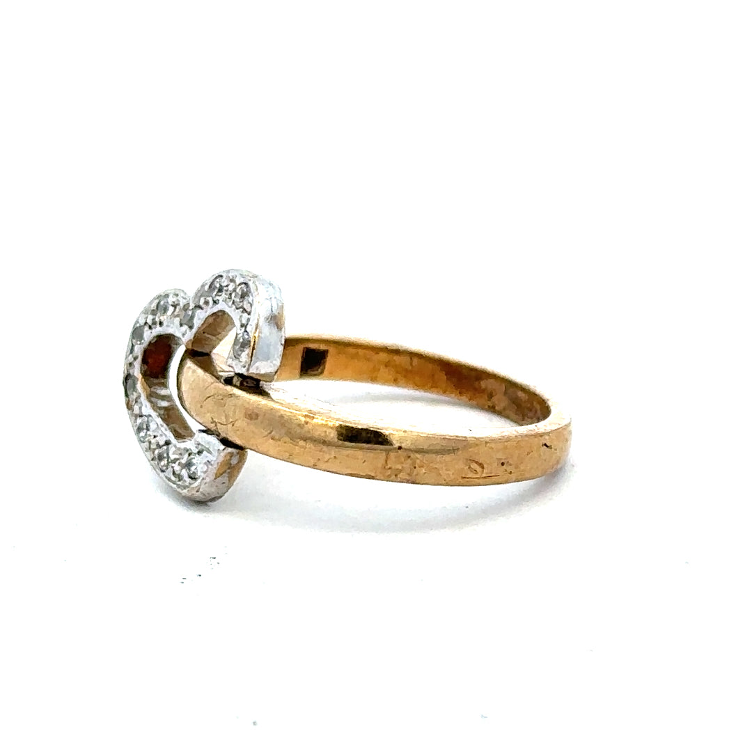 9ct yellow gold ring in size I with a smooth band, unbranded jewelry piece displayed on a plain background.