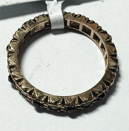 9ct yellow gold ring in size I1/2 with a smooth band, unbranded, showcasing a shiny polished surface.