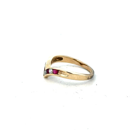 9ct yellow gold ring in size J with a smooth band, unbranded jewelry, shown in a close-up image.